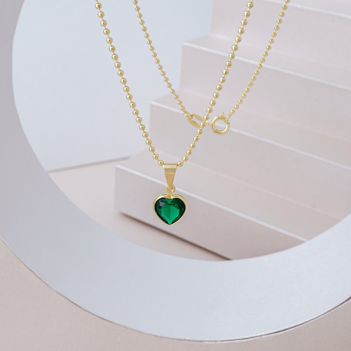 dije corazon circonia verde