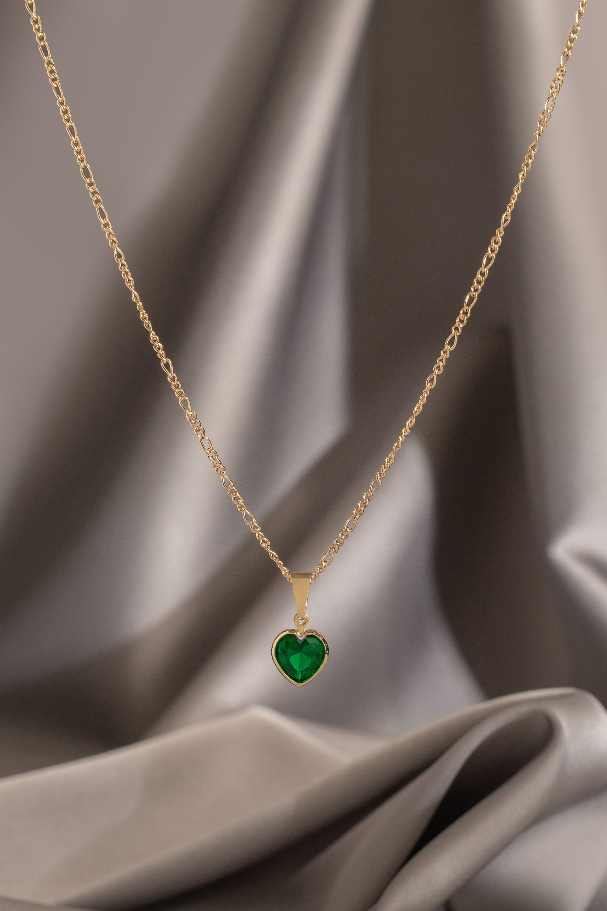 dije corazon circonia verde