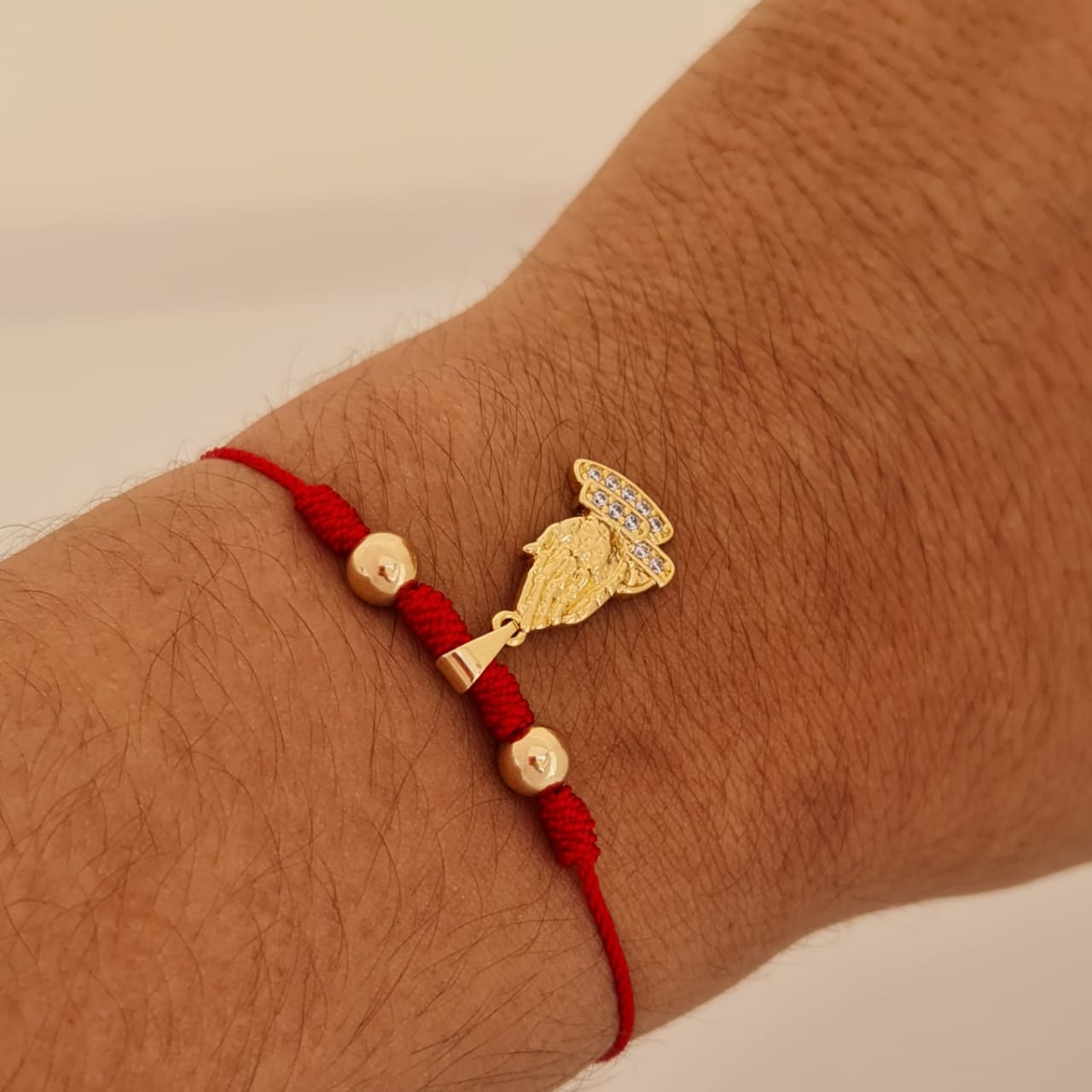 dije manos de oración