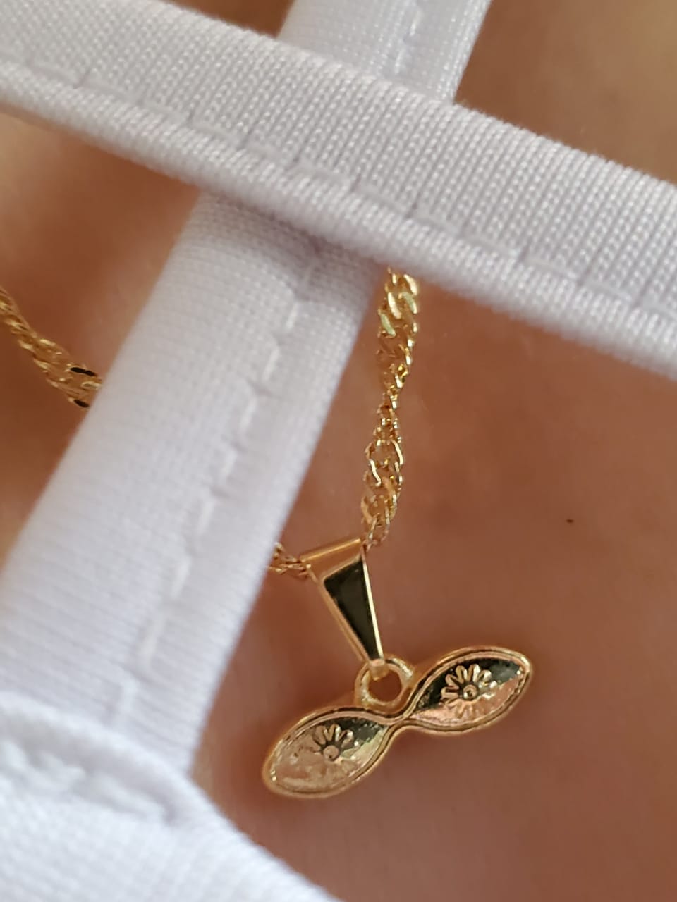 dije ojos de santa lucia