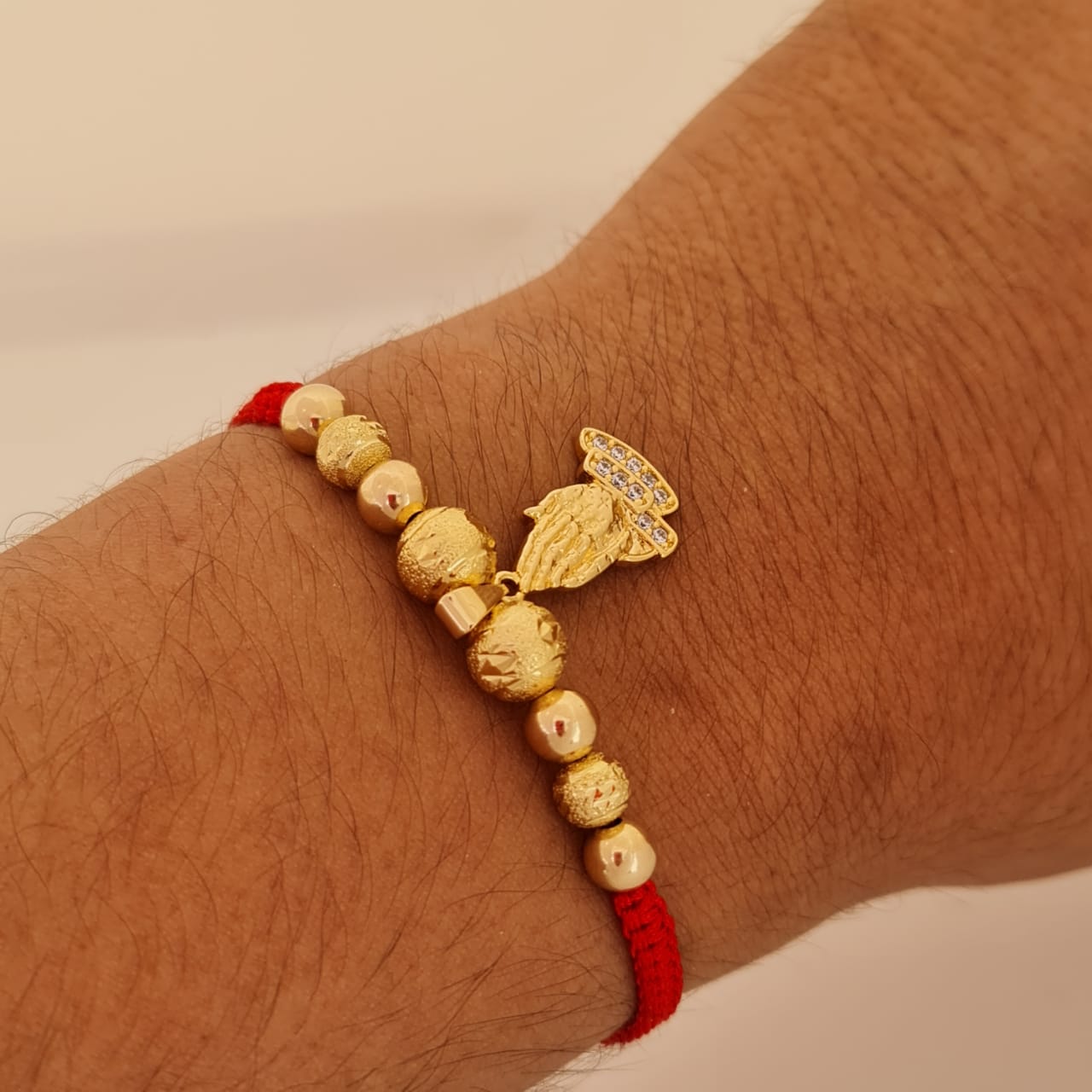 dije manos de oración
