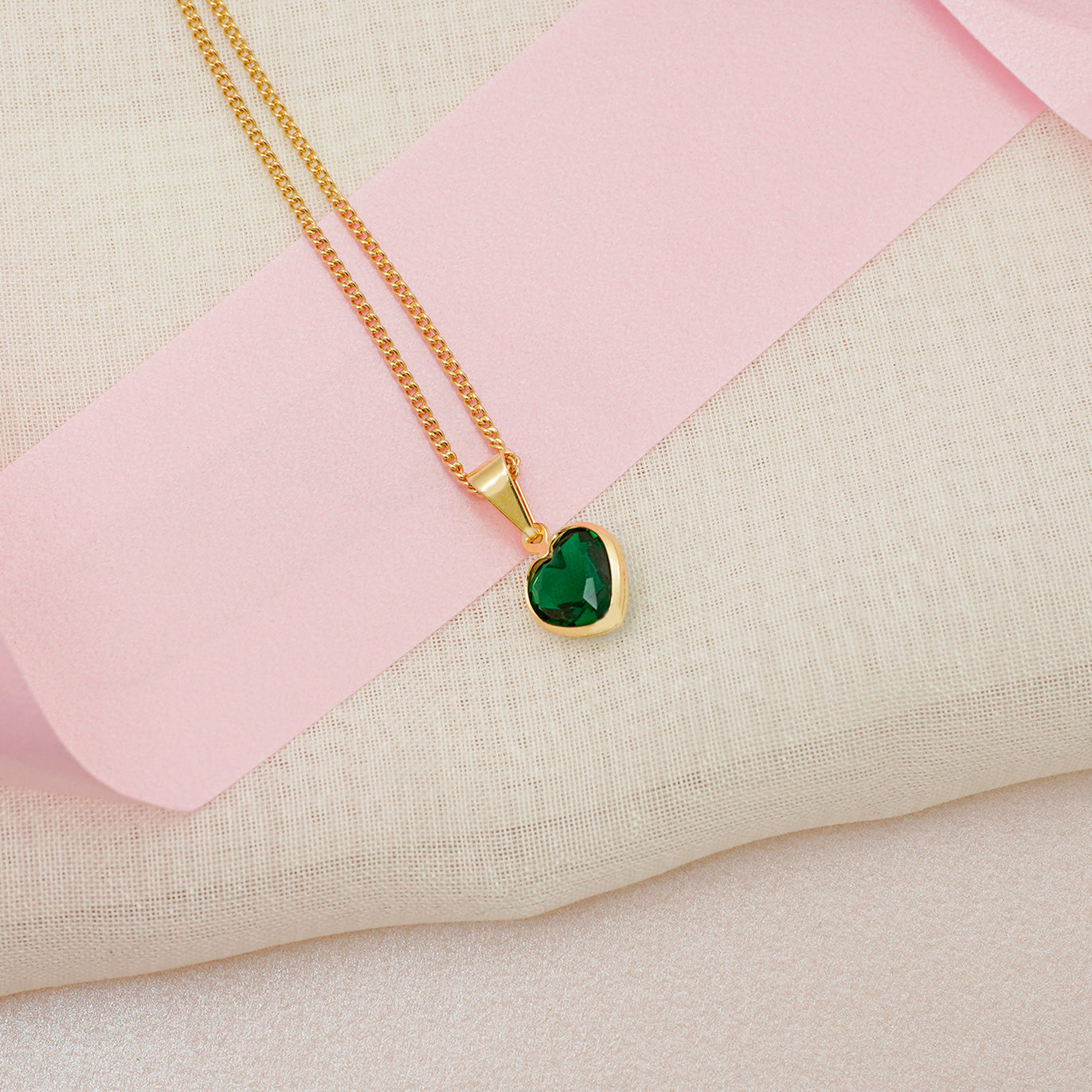 dije corazon circonia verde
