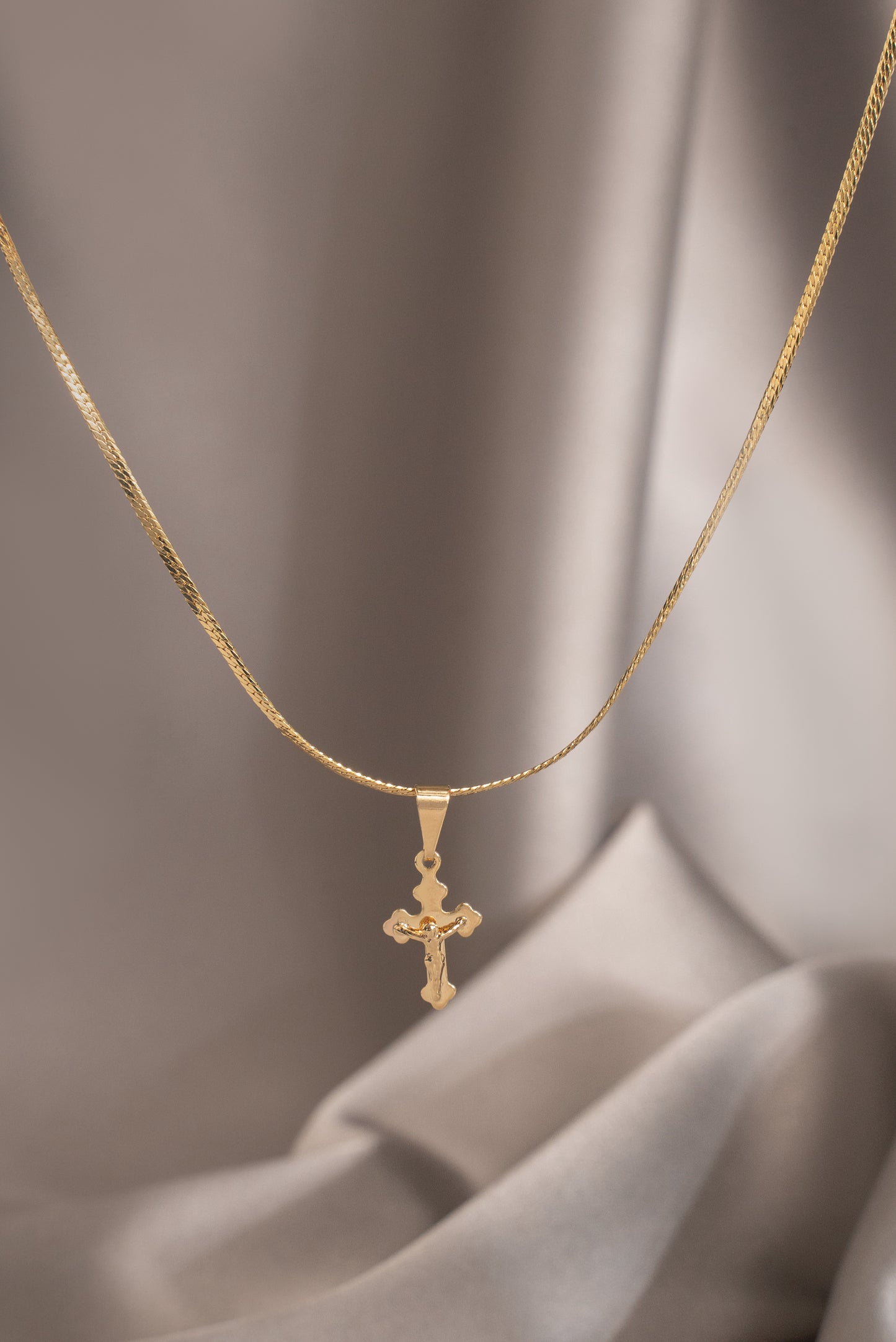 dije cristo pequeño